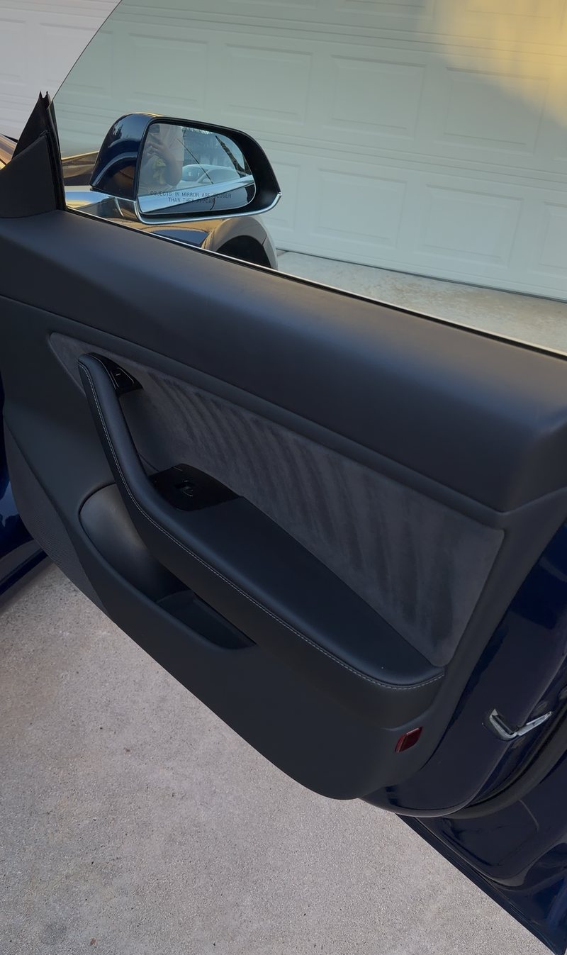 The same door card after cleaning — even matte finish with no streaks or dust in the texture